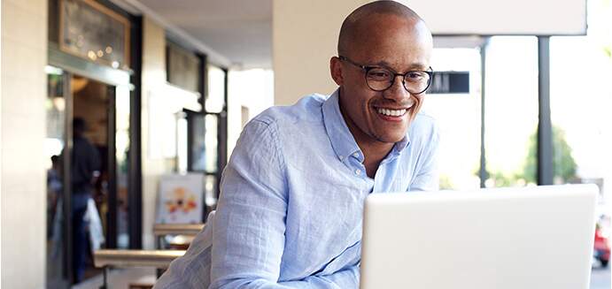  man looking at laptop